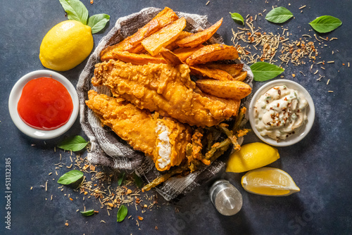 Fish and chips is a popular hot dish consisting of fried fish in crispy batter, served with chips.