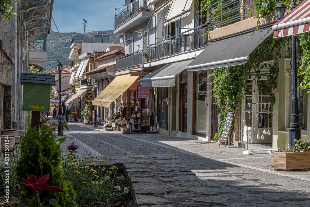  Quiet street view in the small mountainous town of Kalavrita, located in the east-central part of Achaea region, Peloponnes peninsula, West Greece, Greece.