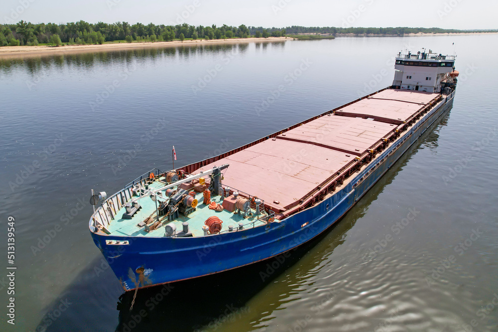 Cargo transportation. Cargo ship on the Volga river in Russia. Volga-Don shipping canal in Volgograd. Russia Cargo transportation. Cargo ship on the Volga river in Russia. Volga-Don shipping canal in Volgograd. Russia