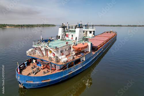 Cargo transportation. Cargo ship on the Volga river in Russia. Volga-Don shipping canal in Volgograd. Russia