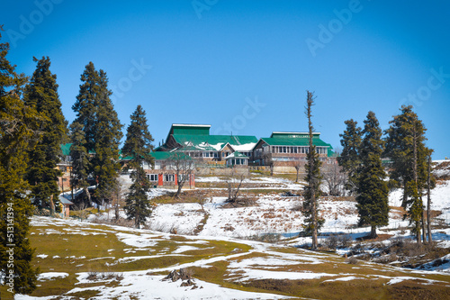 Gulmarg Village in the middle of Himalaya mountain at Kashmir. Snow village at Gulmarg in India. Landscape of beautiful nature of Himalaya mountain at blue sky.