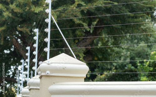 perimeter wall or boundary wall with electric fence for safety and security closeup