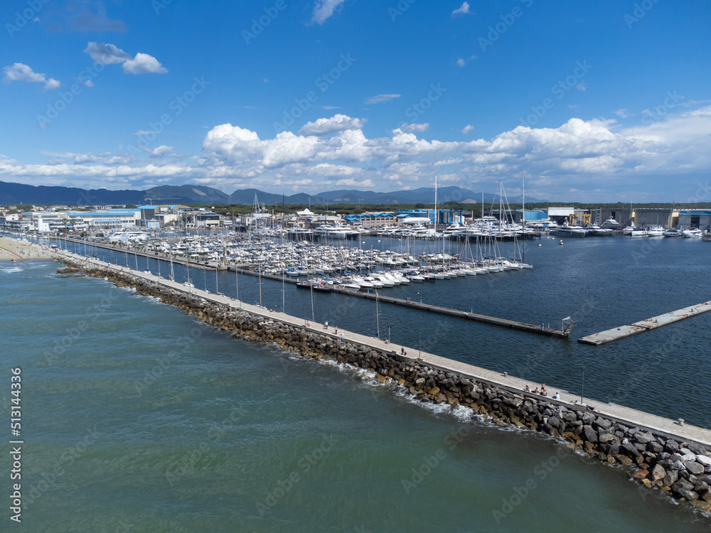 Drone view of pier and marina at Viareggio, Italy.