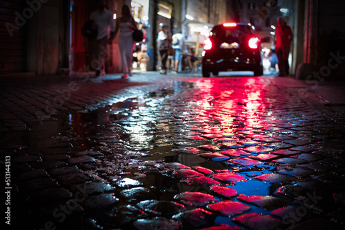 Photography Late night on a rainy evening in Rome, Italy.