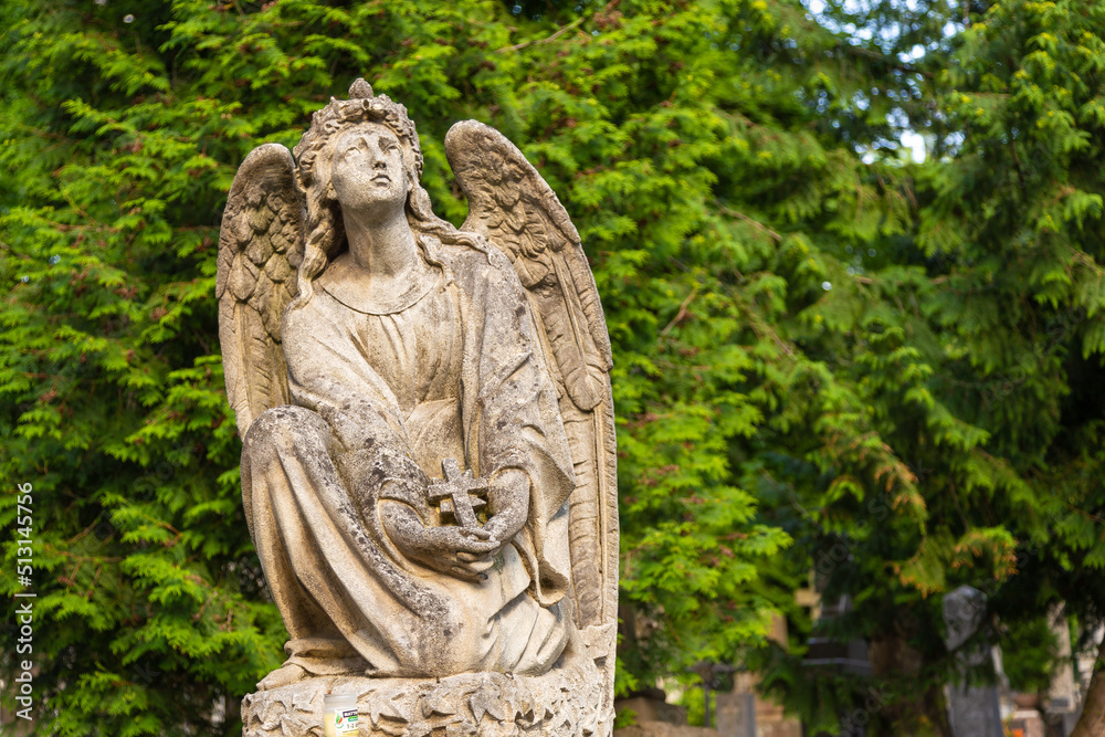 Sculpture on the grave in Lychakiv Cemetery, Lviv, Ukraine.