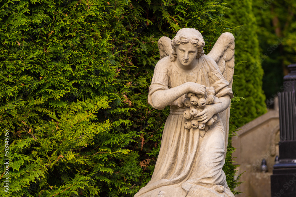 Sculpture on the grave in Lychakiv Cemetery, Lviv, Ukraine.