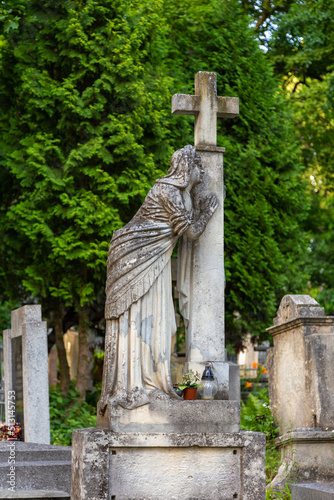 Sculpture on the grave in Lychakiv Cemetery, Lviv, Ukraine.