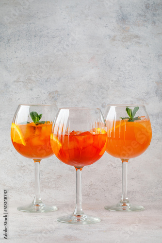 3 Great cocktail in glass with fruit on background on textured background