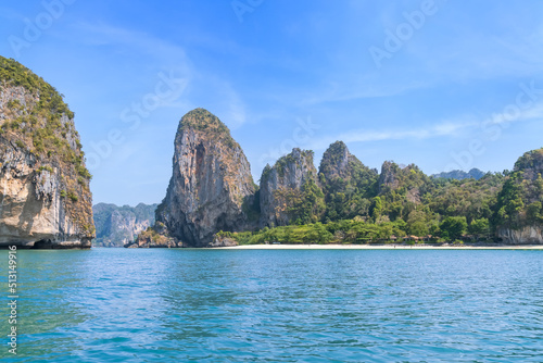 Ao Phra Nang near Railay beach with crystal clear water and exotic landmark limestone cliff mountain, Krabi, Thailand photo