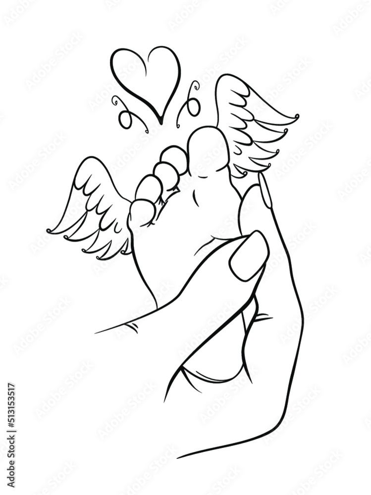 Baby loss memorial. Baby foot in adults hand. Baby foot with angel