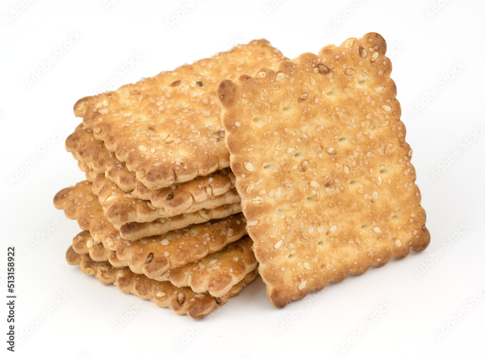 Crispy cracker according to recipes. Sweet cookies on a bun background Crispy cracker according to recipes. Sweet cookies on a bun background
