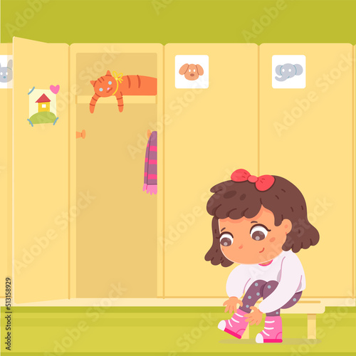 Cute little girl putting on winter boots, kid sitting on bench in school locker room