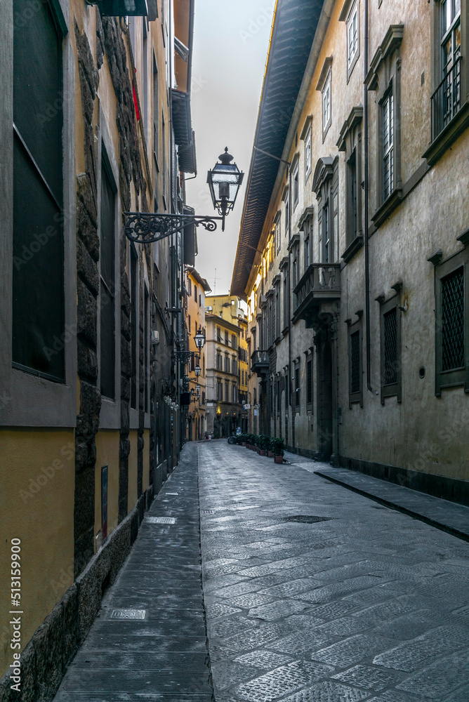 An empty alley in Florence in Italy early in the morning