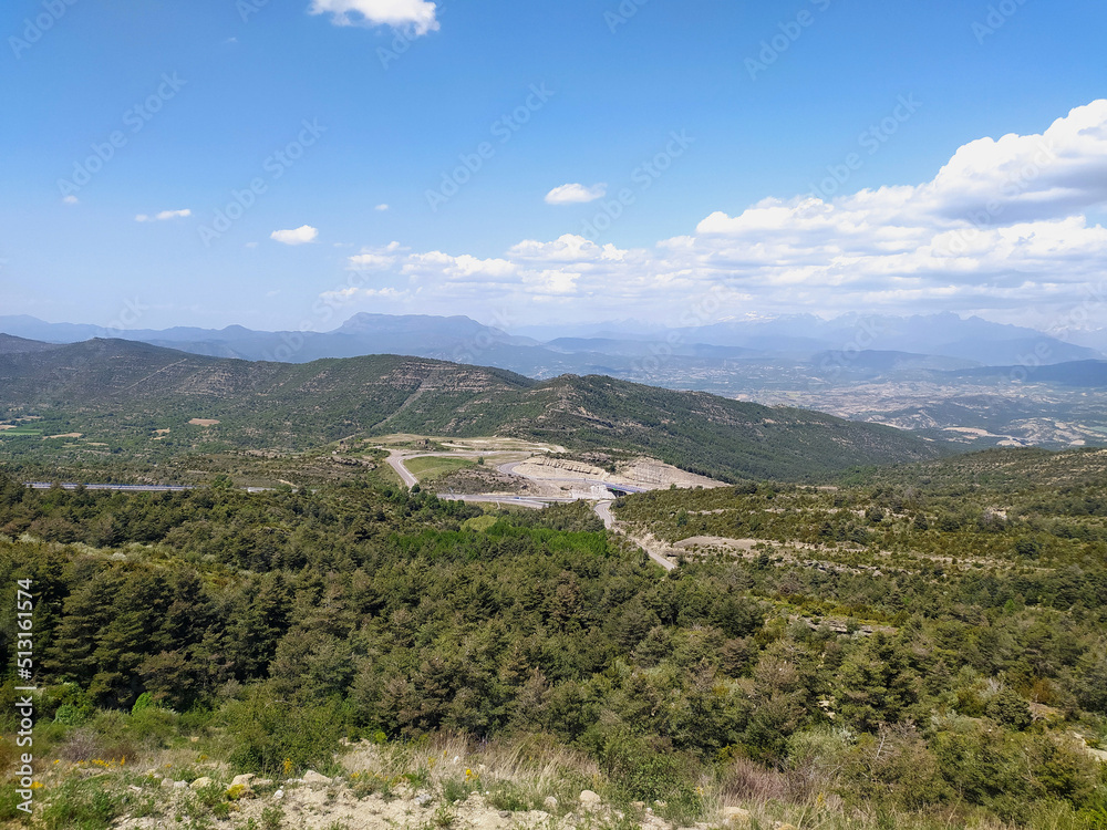Naklejka premium Pyrenees National Park in Spain. Mountains and hills covered with green forests. View from a height of the panorama of nature.