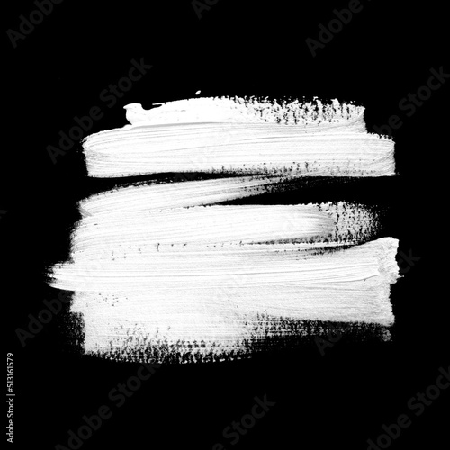 White brush stroke acrylic paint over black background. Art graphic creative design element. Abstract banner template.