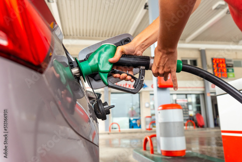 Fotografia, Obraz Refueling gasoline or diesel at the gas station in the fuel crisis with the high