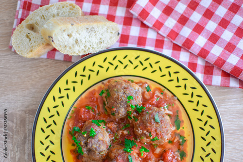 Round meatballs from Romanian traditional cuisine with bolognese sauce photo