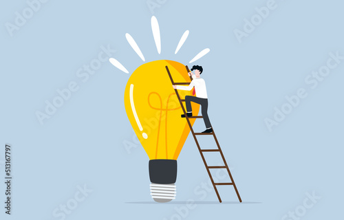 Idea development for career growth, accumulate knowledge, creativity, or skill to help life better concept. Businessman climbing up ladder to stand on big idea light bulb. photo