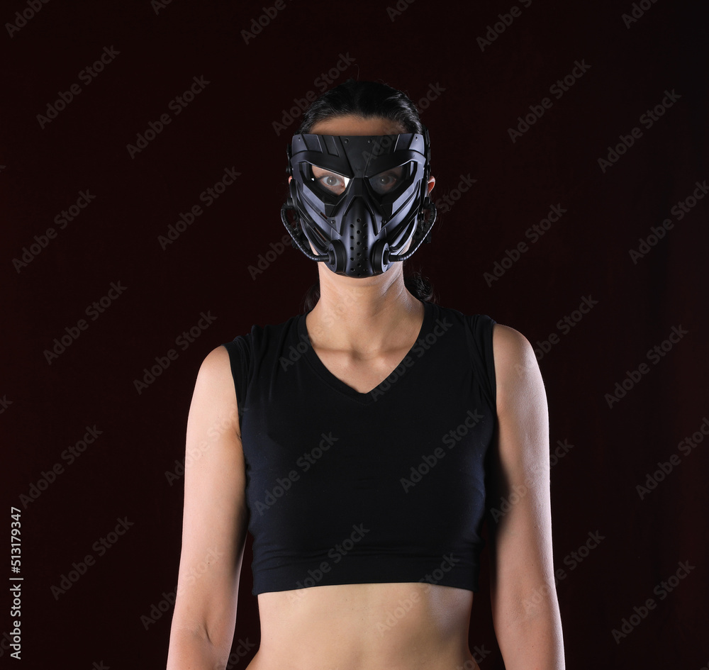 girl in an apocalypse mask on a black background girl in an apocalypse mask on a black background