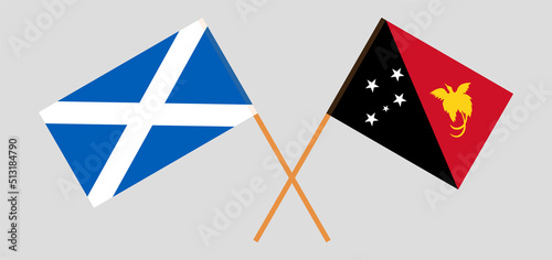 Crossed flags of Scotland and Papua New Guinea. Official colors. Correct proportion