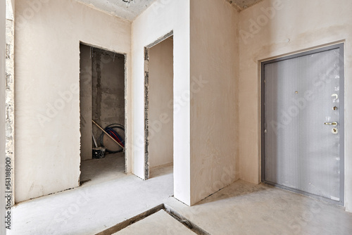 Interior of new apartment without finishing in gray tones © Дмитрий Модестов