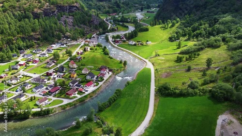 Norway. Flam. Beautiful views of the village of Flam. Waterfall, river, mountains are incredibly beautiful views from the drone. Video 4k photo