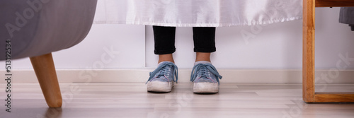 Girl's Feet Behind The Curtain photo