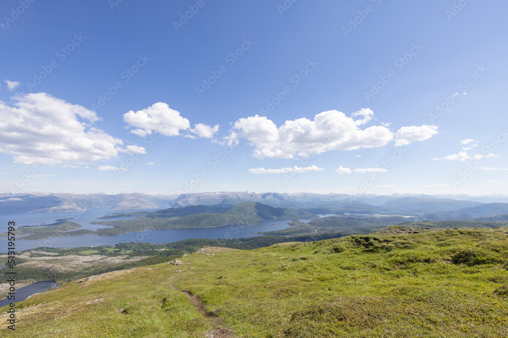 Hiking to the mountains Seterfjellet a warm and beautiful summer day, Northern Norway- Europe	