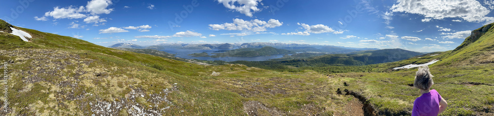 Hiking to the mountains Seterfjellet a warm and beautiful summer day i, Northern Norway- Europe	