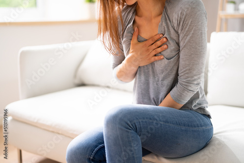 Woman Suffering From Chest Pain