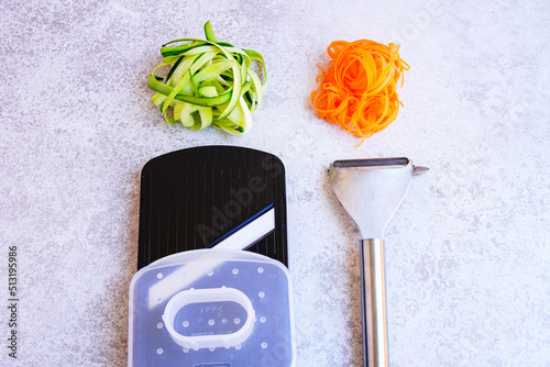 Closeup of  Vegetable slicer and peeler for  salad  photo