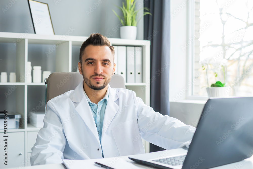Doctor Works in the Medical Office. Workplace of a Professional Therapist in a Hospital or Clinic. The Concept of Healthcare and Medicine. Doctor Works in the Medical Office. Workplace of a Professional Therapist in a Hospital or Clinic. The Concept of Healthcare and Medicine.