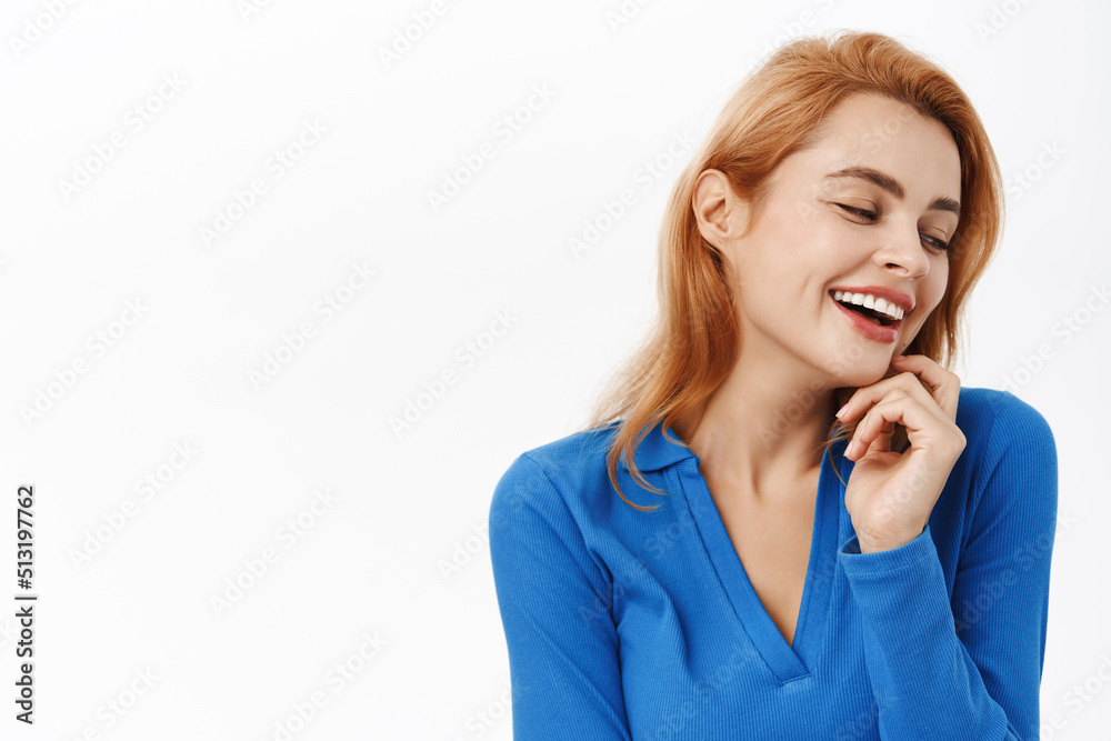 Close up portrait of natural beauty woman, laughing and smiling, she has clear glowing skin, nude makeup, white smile, stands over white background Close up portrait of natural beauty woman, laughing and smiling, she has clear glowing skin, nude makeup, white smile, stands over white background