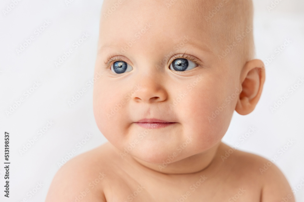 Close-up portrait of cute baby girl with blue eyes Close-up portrait of cute baby girl with blue eyes