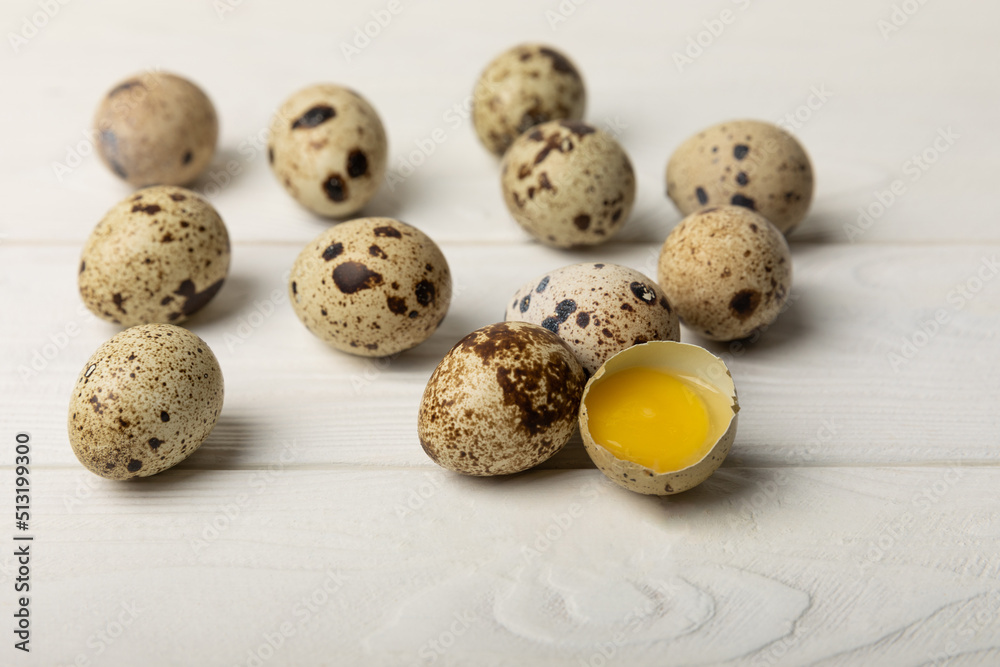 Quail eggs on a white texture background. Whole and broken quail eggs. Natural products. Place for text. Fresh quail eggs. Quail eggs on a white texture background. Whole and broken quail eggs. Natural products. Place for text. Fresh quail eggs.