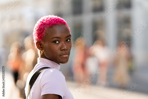 Portrait of a modern stylish young african woman outdoors