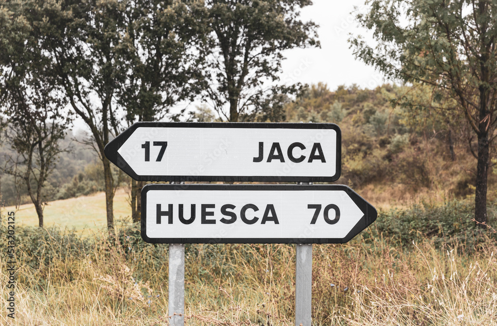 traffic signpost pointing the way to Jaca and Huesca, province of Huesca, Aragon, Spain