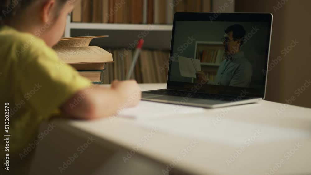 Online school, webcam lessons. Child distance education at home at table with laptop. Girl virtual education college. Technology of online video lessons. Video call of teacher to child. Virtual School Online school, webcam lessons. Child distance education at home at table with laptop. Girl virtual education college. Technology of online video lessons. Video call of teacher to child. Virtual School