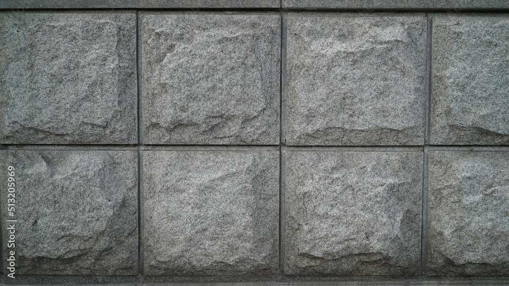 Obraz premium Rough brick surface with large square pattern