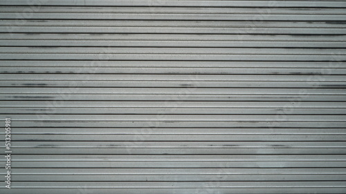 Old and scratched iron shutter door texture