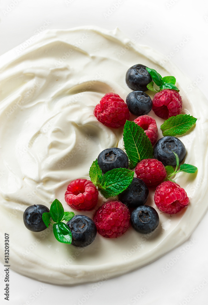 Breakfast, yogurt with fresh berries, raspberries and blueberries, on a white background, selective focus, no people, healthy food, Breakfast, yogurt with fresh berries, raspberries and blueberries, on a white background, selective focus, no people, healthy food,