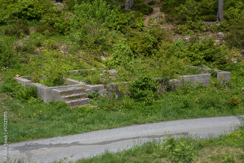 Arendal, Norway - May 28, 2022: Sandvikodden fort was built by the German occupation forces in 1941. The purpose was to secure the entrance to Arendal through Galtesund. Selective focus. photo