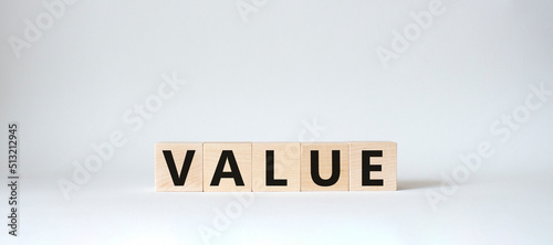 Value symbol. Concept word value on wooden cubes. Beautiful white background. Business and value concept. Copy space.