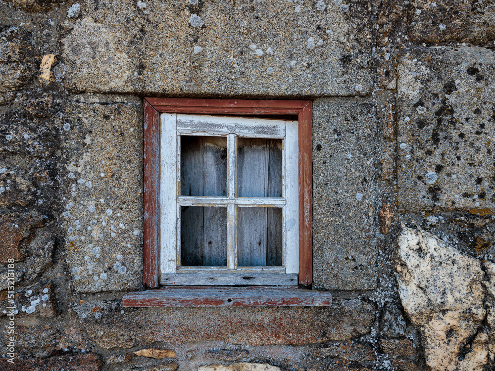 Old wooden window without glass.