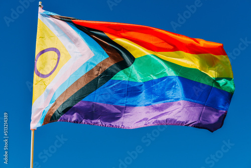 Progress LGBTQ progress rainbow flag waving in the wind