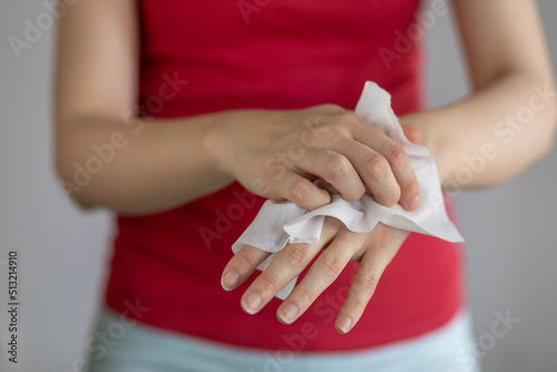 Cleaning hands with baby wet wipes - prevention of infectious diseases © Adam Radosavljevic