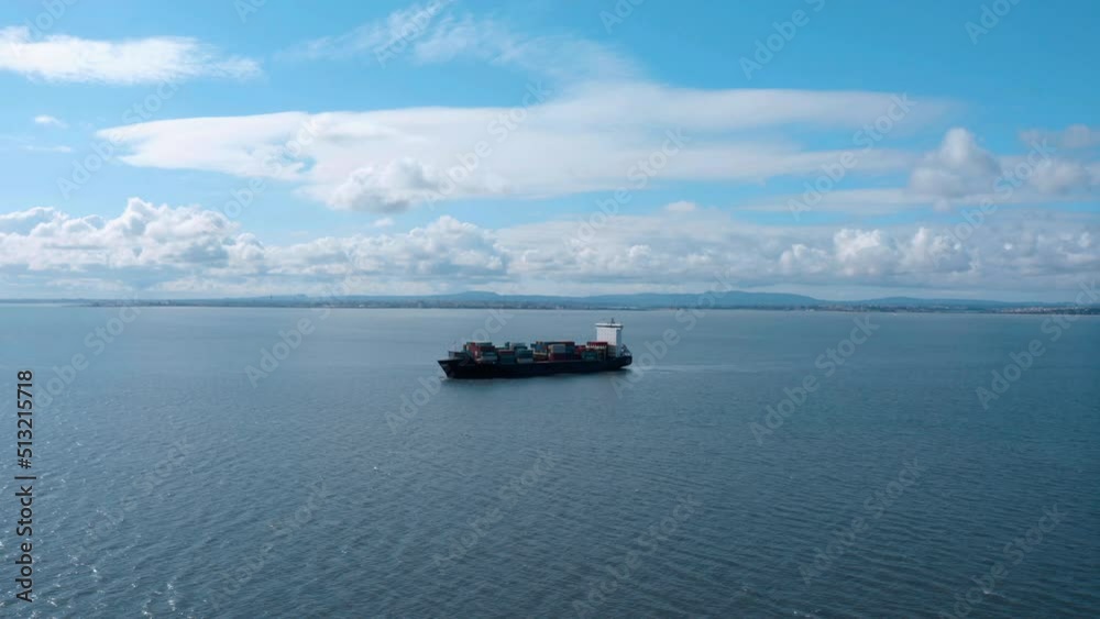 Aerial top view of smart cargo ship carrying container. Concept logistic and supply chain. Import export around in the world. Aerial top view of smart cargo ship carrying container. Concept logistic and supply chain. Import export around in the world.
