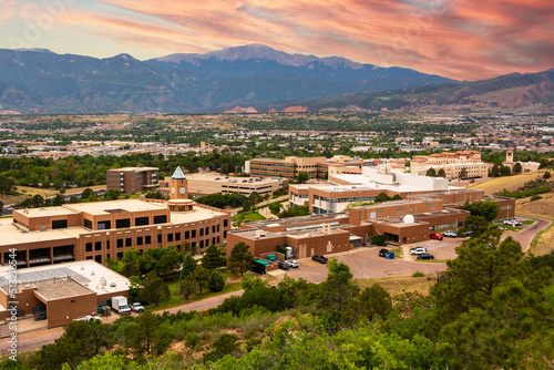 The University of Colorado Colorado Springs Campus During the Day with Pikes Peak and the Rocky Mountains in the Background photo