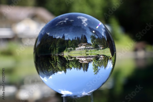 reflection in the lake trough a glas ball at blausee bern Switzerland  © PandaFrog