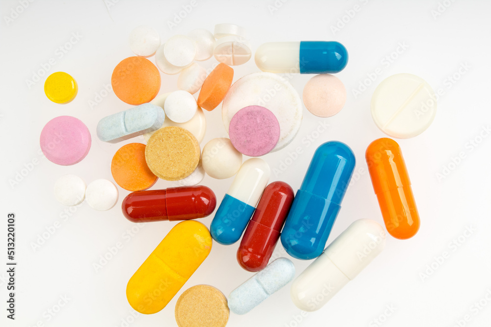 Set of different colorful pills and capsules isolated on white background. Set of different colorful pills and capsules isolated on white background.
